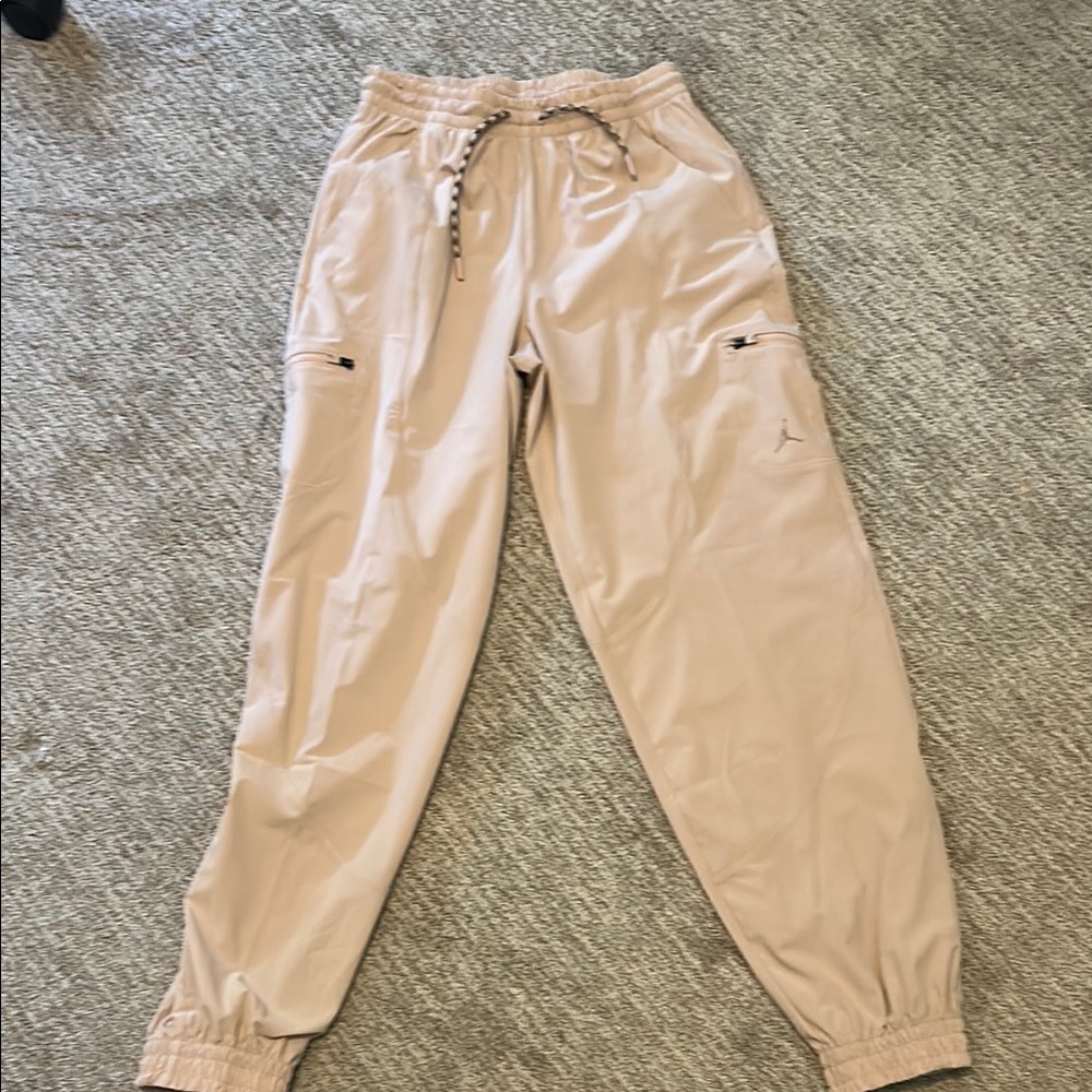 Size small, Nike Jordans, dri-fit, zip close cargo pocket, pale pink joggers.